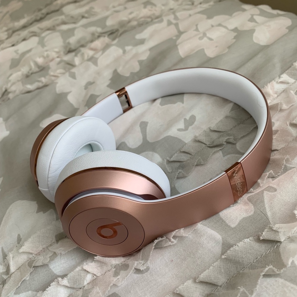 Rose gold Beats headphones